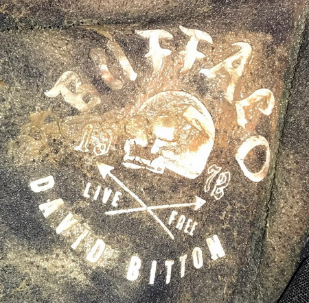 Photo of Black hoodie with a skull logo and the words, Buffalo 1972 David Britton text surrounding the logo