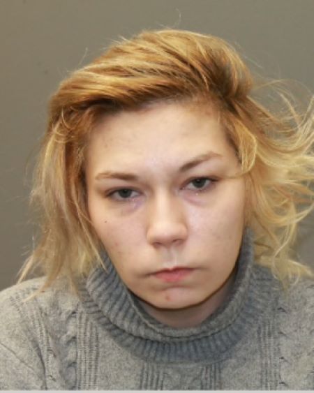 A head and shoulders photo of Taylor Chamings with shoulder-length blond hair and a grey sweater. 